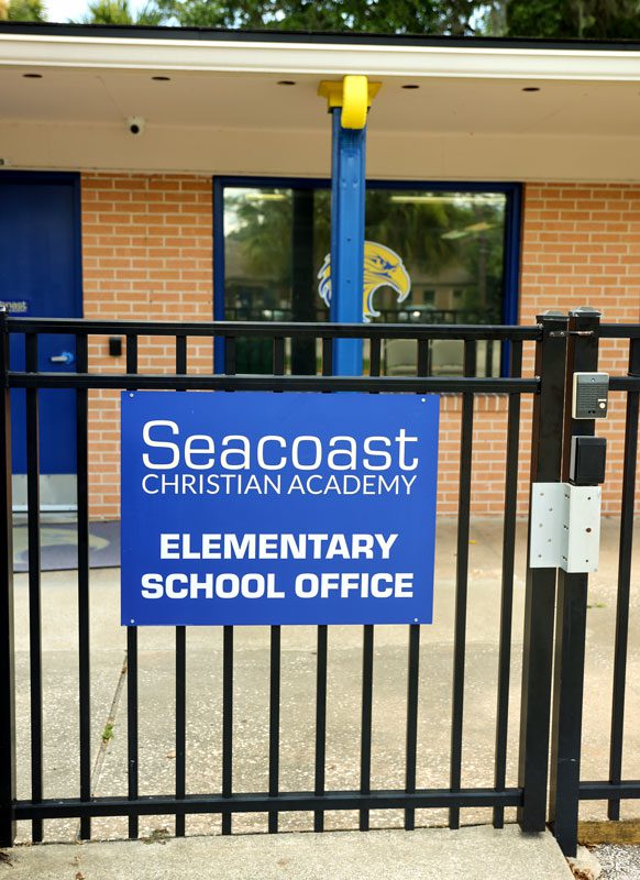 Sign on the gate at the Seacoast Christian Academy elementary school office